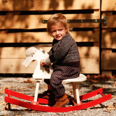 Zirkuss Kindermode Shop Zürich Schaukelpferd