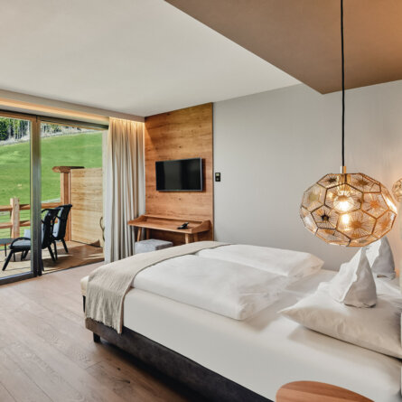 Cyprianerhof Dolomit Resort_Traun Suite Schlafzimmer I Michael Huber
